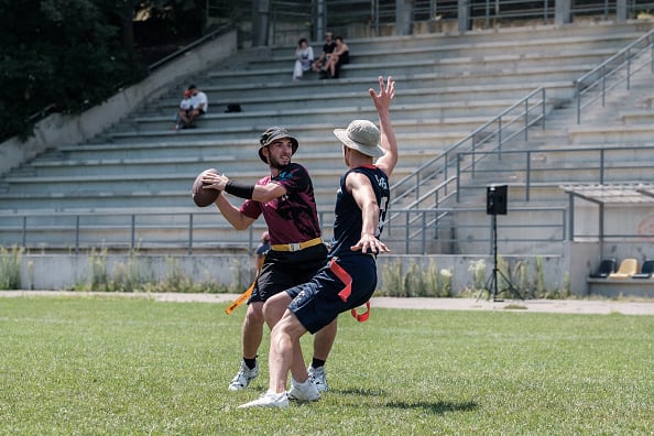 LVIV, UKRAINE - JULY 28: Ihor Nikolaiets #11 of FC Bisons (Zhytomyr) competes for the ball whilst under pressure from Volodymyr Panasiuk #3 of FC Eagles (Zdolbuniv) during the flag football final tour of 2024 Menâ  s Ukrainian League of American Football on July 28, 2024 in Lviv, Ukraine. (Photo by Les Kasyanov/Global Images Ukraine via Getty Images)