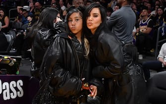 LOS ANGELES, CALIFORNIA - APRIL 09: Kim Kardashian (R) and North West attend a basketball game between the Los Angeles Lakers and the Golden State Warriors at Crypto.com Arena on April 09, 2024 in Los Angeles, California. NOTE TO USER: User expressly acknowledges and agrees that, by downloading and or using this photograph, User is consenting to the terms and conditions of the Getty Images License Agreement. (Photo by Allen Berezovsky/Getty Images)