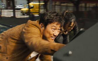 (from left) Han (Sung Kang) and Mia (Jordana Brewster) in F9, co-written and directed by Justin Lin.