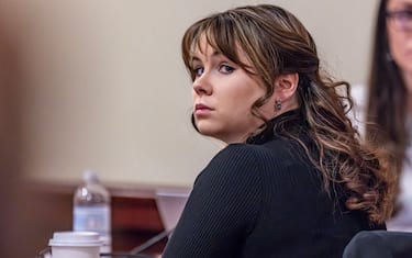 TOPSHOT - Hannah Gutierrez-Reed, the former armorer at the movie Rust, listens to closing arguments in her trial at the First Judicial District Courthouse in Santa Fe, New Mexico, on March 6, 2024. The woman in charge of weapons on the set of the Alec Baldwin movie "Rust," where a cinematographer was shot dead, was convicted March 6, of involuntary manslaughter.
A jury in New Mexico took just over two hours to find Hannah Gutierrez guilty of the death of Halyna Hutchins in October 2021.
A 10-day trial heard how as the film's armorer, Gutierrez had been ultimately responsible for the use of live rounds on set -- a red line across the industry. (Photo by Luis Sánchez Saturno / POOL / AFP) (Photo by LUIS SANCHEZ SATURNO/POOL/AFP via Getty Images)