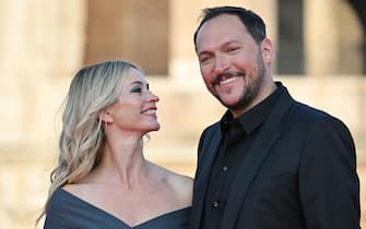 French director Louis Leterrier and US actress Cameron Richardson arrive for the Premiere of the film "Fast X", the tenth film in the Fast & Furious Saga, on May 12, 2023 at the Colosseum monument in Rome. (Photo by Alberto PIZZOLI / AFP) (Photo by ALBERTO PIZZOLI/AFP via Getty Images)