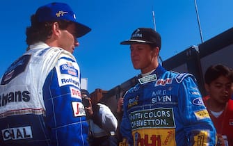 Imola, Italy.
29/4-1/5 1994.
Michael Schumacher (Benetton Ford) talks to Ayrton Senna (Williams Renault).
Ref-94 SM 03.
World Copyright - LAT Photographic