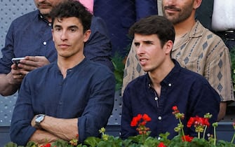(L-R) Marc Márquez and Álex Márquez during the match between Carlos Alcaraz against Alexander Zverev at the Mutua Madrid Open 2022 at La Caja Magica in Madrid. (Photo by Atilano Garcia / SOPA Images/Sipa USA)