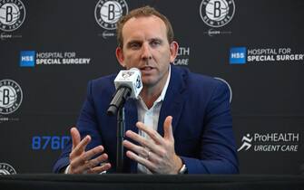 BROOKLYN, NY - JUNE 26:  Sean Marks, GM of the Brooklyn Nets, introduces D'Angelo Russell and Timofey Mozgov during a press conference on June 26, 2017 at HSS Training Center in Brooklyn, New York. NOTE TO USER: User expressly acknowledges and agrees that, by downloading and or using this Photograph, user is consenting to the terms and conditions of the Getty Images License Agreement. Mandatory Copyright Notice: Copyright 2017 NBAE (Photo by Nathaniel S. Butler/NBAE via Getty Images)