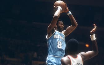 NEW YORK - CIRCA 1977:  Marvin Barnes #8 of the Buffalo Braves goes up to shoot over Bob McAdoo #11 of the New York Knicks during an NBA basketball game circa 1977 at Madison Square Garden in the Manhattan borough of New York City. Barnes played for the Braves from 1977-78. (Photo by Focus on Sport/Getty Images) *** Local Caption *** Marvin Barnes; Bob McAdoo