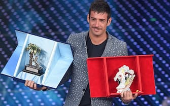 SANREMO, ITALY - FEBRUARY 12:  Italian singer Francesco Gabbani, winner of Nuove Proposte category of the 66th Italian Music Festival in Sanremo, poses with his trophy at the Ariston theatre during the Fourth night on February 12, 2016 in Sanremo, Italy.  (Photo by Venturelli/Getty Images)