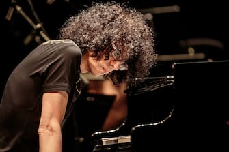 MILAN, ITALY - May 18: Italian pianist and composer Giovanni Allevi performs for AIRC, with Opera Choir of Parma and the Italian Symphony Orchestra on May 18, 2016 in Milan, Italy. (Photo by Sergione Infuso /Corbis via Getty Images)