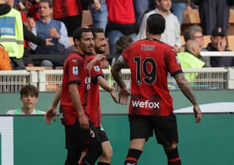 AC Milan's defender Alessandro Florenzi  celebrates his goal with AC Milan's midfielder Ismael Bennacer (left) and AC Milan's defender Theo Hernandez during the Italian Serie A soccer match between AC Milan and CFC Genoa at Giaseppe Meazza Stadium in Milan, Italy, 5 May 2024. ANSA / ROBERTO BREGANI