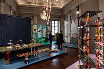 MILAN, ITALY - APRIL 15: People visit the installation "Riches to Rags" by Markus Benesch for Curious Boy, exhibited at Palazzo Litta, during the Milan Design Week 2024 on April 15, 2024 in Milan, Italy. Every year, the Salone Internazionale del Mobile and Fuorisalone define the Milan Design Week, the worldâ  s largest annual furniture and design event. Centered on principles of circular economy, reuse, and sustainable practices and materials, the Fuorisaloneâ  s 24 theme:Â â  Materia Naturaâ  , seeks to foster a culture of mindful design. (Photo by Emanuele Cremaschi/Getty Images)