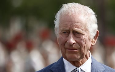 (FILES) Britain's King Charles III looks on during an official welcoming ceremony at the Arc de Triomphe in Paris on September 20, 2023, on the first day of a state visit to France. Britain's King Charles III has been diagnosed with a "form of cancer" according to a statement released by Buckingham Palace on February 5, 2024. (Photo by Yoan VALAT / POOL / AFP)