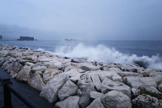 NAPOLI, ITALY - 2022/11/04: Waves break on the seafront of Mergellina with the Castel dell'Ovo in Naples in the background. After months of heat and drought, heavy rains and thunderstorms hit the whole of Italy and Southern Italy, creating damage, inconvenience to the population and flooding. (Photo by Vincenzo Izzo/LightRocket via Getty Images)