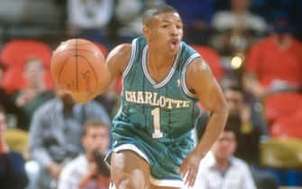 LANDOVER, MD - CIRCA 1991: Muggsy Bogues #1 of the Charlotte Hornets dribbles the ball up court against the Washington Bullets during an NBA basketball game circa 1991 at the Capital Centre in Landover, Maryland. Bogues played for the Hornets from 1988-97. (Photo by Focus on Sport/Getty Images) *** Local Caption *** Muggsy Bogues