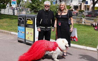 CANNES, FRANCE - MAY 17: Pedro Almodovar is seen posing for a picture with a fan outside "Le Majestic" Hotel  during the 76th Cannes film festival on May 17, 2023 in Cannes, France. (Photo by Pierre Suu/GC Images)