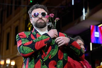 Italian singer Dargen DÕAmico arrives on the green carpet during an event held at the eve of the 74th Sanremo Italian Song Festival, Sanremo, Italy, 05 February 2024. The festival runs from 06 to 10 February 2024. ANSA/RICCARDO ANTIMIANI