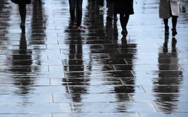 epa06440314 Shadows of commuters as they walk over London Bridge on what is known as 'Blue Monday' in London, Britain, 15 January 2018. Blue Monday is a name given to a day in January, typically the third Monday of the month. It is said to be the most depressing day of the year.  EPA/ANDY RAIN