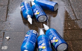 Empty large size cannisters of Goldwhip nitrous oxide / laughing gas lying on the street on 23rd April 2023 in London, United Kingdom. It has been reported that these large cannisters, which are currently legal, are being used by young people in particular, but the amount of gas which they are taking due to difficulty in guaging the amount taken, is creating long term negative health affects. Nitrous oxide, commonly known as laughing gas, nitrous, nitro, or NOS is now a very common legal high used by young people. Nitrous oxide can cause analgesia, depersonalisation, derealisation, dizziness, euphoria, and some sound distortion. Inhalation of nitrous oxide for recreational use, with the purpose of causing euphoria and/or slight hallucinations, began as a phenomenon for the British upper class in 1799, known as laughing gas parties. (photo by Mike Kemp/In Pictures via Getty Images)