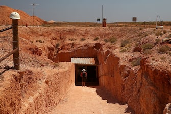COOBER PEDY, AUSTRALIA - OCTOBER 22: A general view is seen of the entry into Tom's Working Opal Mine on October 22, 2015 in Coober Pedy, Australia.  Tom's Working Opal Mine is an underground mine located within the active mining area, open to the public giving an insight into the workings of an opal mine.  (Photo by Mark Kolbe/Getty Images)