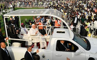 Pope Francis (C) waves as he arrives by popemobile for the holy mass at the John Garang Mausoleum in Juba, South Sudan, on February 5, 2023. - Pope Francis wraps up his pilgrimage to South Sudan with an open-air mass on February 5, 2023 after urging its leaders to focus on bringing peace to the fragile country torn apart by violence and poverty.
The three-day trip is the first papal visit to the largely Christian country since it achieved independence from Sudan in 2011 and plunged into a civil war that killed nearly 400,000 people. (Photo by Simon MAINA / AFP) (Photo by SIMON MAINA/AFP via Getty Images)