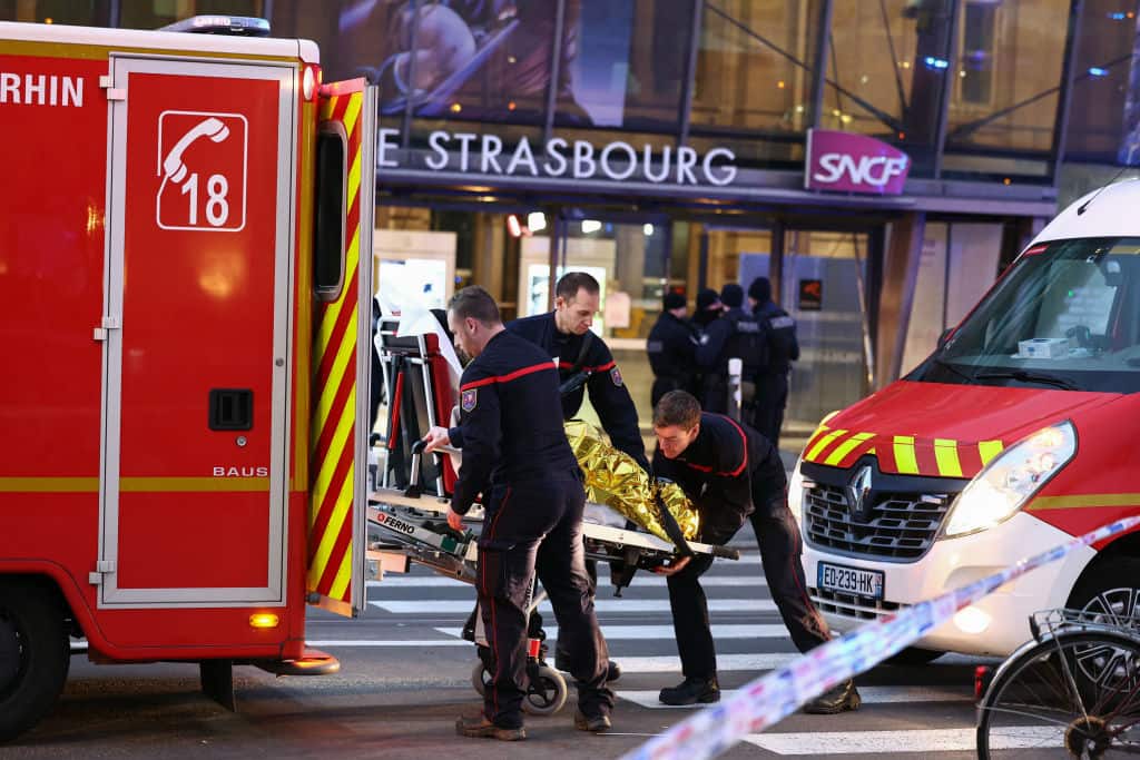 Firefighters carry an injured person on a stretcher outside the Strasbourg railway station  following a collision of two trams, in Strasbourg, eastern France, on January 11, 2025. Two trams collided in a tunnel in the eastern French city of Strasbourg on January 11, 2025, injuring twenty people, the authorities said. "Twenty people" have been injured, said a spokesman for the prefecture, adding that the cause of the accident had not yet been established. (Photo by FREDERICK FLORIN / AFP) (Photo by FREDERICK FLORIN/AFP via Getty Images)