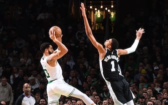 BOSTON, MA - JANUARY 17: Jayson Tatum #0 of the Boston Celtics passes the ball against defender Victor Wembanyama #1 of the San Antonio Spurs during the game on January 17, 2024 at the TD Garden in Boston, Massachusetts. NOTE TO USER: User expressly acknowledges and agrees that, by downloading and or using this photograph, User is consenting to the terms and conditions of the Getty Images License Agreement. Mandatory Copyright Notice: Copyright 2024 NBAE  (Photo by Brian Babineau/NBAE via Getty Images)