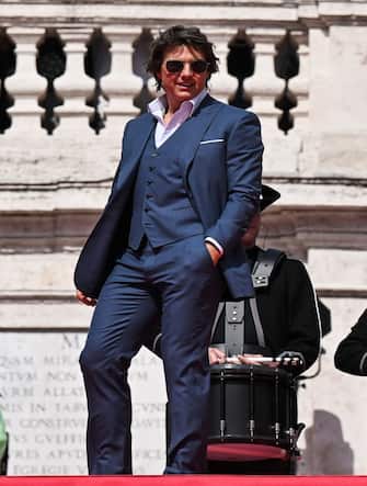 US producer and actor Tom Cruise poses at Trinita dei Monti ahead of the premiere of "Mission: Impossible - Dead Reckoning Part One" movie in Rome, on June 19, 2023. (Photo by Tiziana FABI / AFP) (Photo by TIZIANA FABI/AFP via Getty Images)