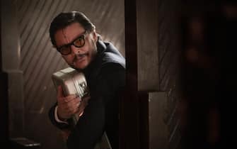 Drive Away-Dolls Pedro Pascal stars as "The Collector" in director Ethan Coen's DRIVE-AWAY DOLLS, a Focus Features release. Credit: Wilson Webb / Working Title / Focus Features