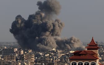 A picture taken from Rafah shows smoke billowing over Khan Yunis in the southern Gaza Strip during Israeli bombardment on January 21, 2024, amid ongoing battles between Israel and the Palestinian militant group Hamas. (Photo by AFP)