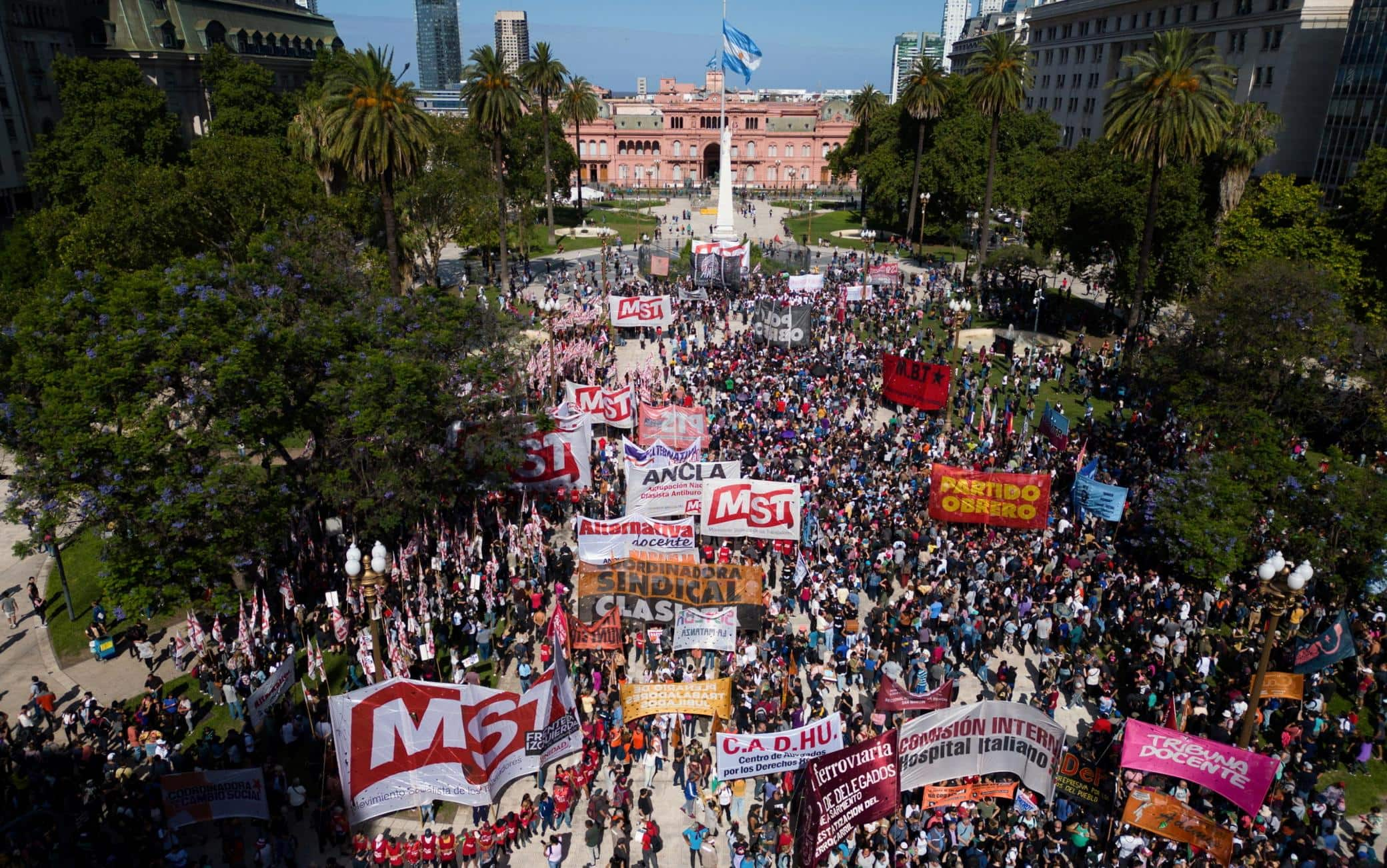 epa11039229 An image taken with a drone of citizens during a protest against the goverment of new Argentinian President Javier Milei near the Casa Rosada government building in Buenos Aires, Argentina, 20 December 2023. The day of mobilizations advanced in Argentina, with the government of Javier Milei monitoring the main access roads to Buenos Aires and the organizers of the protests changing the route of the large demonstration. Milei faced his first protests after assuming as president on 10 December 2023.  EPA/Isaac Fontana