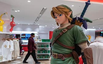 This photo taken on May 8, 2023 shows a display (R) for Japanese gaming giant Nintendo's long-running "Legend of Zelda" game series, at the company's official store in Tokyo's Shibuya district. - Nintendo, who will report net annual earnings later on May 9, will also release the latest instalment in its long-running "Legend of Zelda" game series, titled "Tears of the Kingdom", for the Switch on May 12. (Photo by Richard A. Brooks / AFP) (Photo by RICHARD A. BROOKS/AFP via Getty Images)