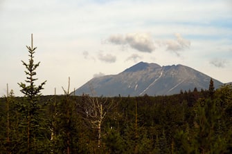 PATTEN, ME - AUGUST 19: A view of Katahdin along the Katahdin Loop Rd. in Katahdin Woods and Waters National Monument Thursday, August 19, 2021. (Staff Photo by Shawn Patrick Ouellette/Portland Press Herald via Getty Images)
