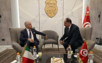 epa10629461 Italian Interior Minister Matteo Piantedosi (L)  with Tunisian Interior Minister Kamel Fekih (R) during their meeting at the airport in Tunis, Tunisia, 15 May 2023. Italian Interior Minister Matteo Piantedosi is on an official visit to Tunisia .This visit comes as Tunisia suffers from the increase in migratory flows.  EPA/MOHAMED MESSARA