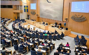 Members of the Swedish Parliament attend a session where they  debated and voted on a law lowering the age required for people to legally change their gender from 18 to 16 in Stockholm, Sweden on April 17, 2024. Sweden's parliament on April 17, 2024 passed a controversial law lowering the minimum age to legally change gender from 18 to 16 and amending the procedure for access to surgical interventions. (Photo by Jessica Gow/TT / various sources / AFP) / Sweden OUT (Photo by JESSICA GOW/TT/TT NEWS AGENCY/AFP via Getty Images)