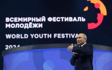 In this pool photograph distributed by Russian state owned agency, Russia's President Vladimir Putin delivers a speech during the closing ceremony of the 2024 World Youth Festival (WYF) at the Sirius Federal Territory, in Sochi, Krasnodar Region, on March 6, 2024. (Photo by Mikhail METZEL / POOL / AFP) (Photo by MIKHAIL METZEL/POOL/AFP via Getty Images)