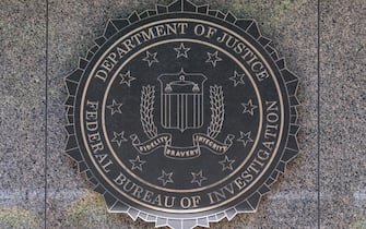 FBI Logo and Sign on the exterior of the J Edgar Hoover FBI Building, Pennsylvania Avenue, Washington DC, USA