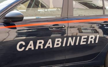 Carabinieri sign on the side of the car. Italian Carabinieri car in action in the streets of the city. Police security car