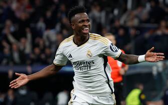 epa11202950 Real Madrid's Vinicius Junior celebrates after scoring the 1-0 goal during the UEFA Champions League round of 16 second leg soccer match between Real Madrid and RB Leipzig in Madrid, Spain, 06 March 2024.  EPA/J.J. Guillen