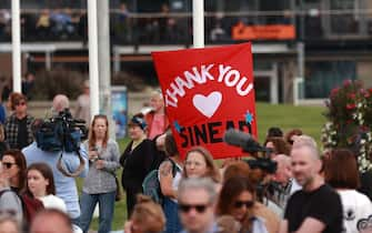 Fans outside the former home of Sinead O'Connor in Bray, Co Wicklow, ahead of the late singer's funeral today. Picture date: Tuesday August 8, 2023.