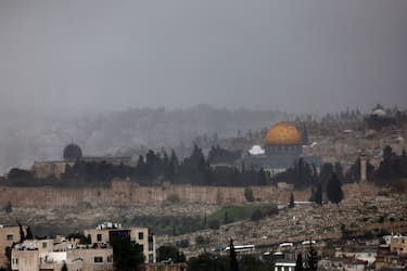 A picture taken from Mount of Olives shows the Dome of the Rock shrine in Jerusalem's Old City during a stormy day on February 7, 2023. (Photo by AHMAD GHARABLI / AFP) (Photo by AHMAD GHARABLI/AFP via Getty Images)