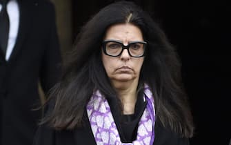 L'Oreal heiress Francoise Bettencourt-Meyers leaves after attending the funeral ceremony for French journalist Jacques Chancel at the Saint-Germain-des-Pres church in Paris on January 6, 2015. Chancel died on December 23, 2014 in Paris at the age of 86. AFP PHOTO / MARTIN BUREAU        (Photo credit should read MARTIN BUREAU/AFP via Getty Images)