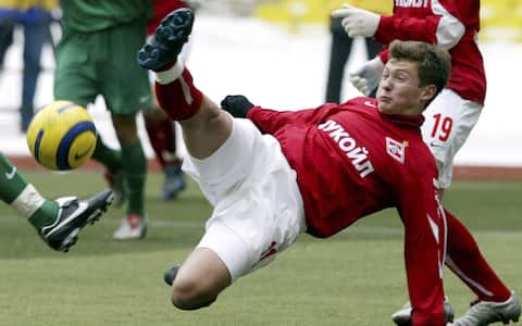 MOSCOW - MARCH 20:  Alexandr Pavlenko of Spartak Moscow competes for the ball during the Football Russian League Championship match between Spartak Moscow v Rubin Kazan on March 20, 2005 in Moscow, Russia. (Photo by Dima Korotayev/Pressphotos/Getty Images)