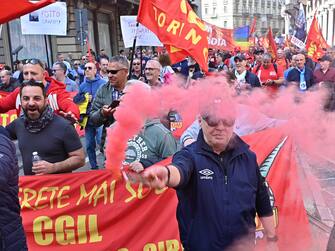 Corteo "Il rilancio di Torino parte da Mirafiori" organizzata da tutte le sigle sindacali, Torino, 12 aprile 2024 ANSA/ALESSANDRO DI MARCO