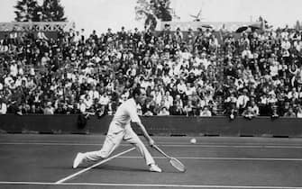 Italian tennis player Giorgio De Stefani prepares a return here in may 1934 during the French tennis championships at Roland Garros stadium. (Photo by - / AFP)        (Photo credit should read -/AFP via Getty Images)