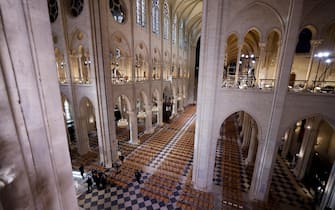 epa11762388 An interior view of the Notre Dame de Paris cathedral, ahead of its official reopening ceremony, in Paris, France, 07 December 2024. The Notre Dame de Paris Cathedral reopens on 07 December after nearly six years of renovation work following its destruction by a fire on 15 April 2019.  EPA/LUDOVIC MARIN / POOL  MAXPPP OUT