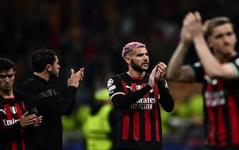 (From L) AC Milan's Spanish midfielder Brahim Diaz, AC Milan's Italian defender Davide Calabria, AC Milan's French defender Theo Hernandez and AC Milan's Belgian forward Alexis Saelemaekers acknowledge the public at the end of the UEFA Champions League semi-final first leg football match between AC Milan and Inter Milan, on May 10, 2023 at the San Siro stadium in Milan. (Photo by GABRIEL BOUYS / AFP) (Photo by GABRIEL BOUYS/AFP via Getty Images)