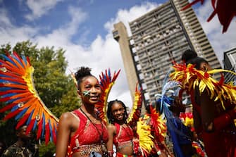 epa10823114 Young people participate in the Children's Day Parade on the first day of the Notting Hill Carnival in London, Britain, 27 August 2023. Notting Hill is the largest street carnival in Europe and is a community-led celebration of Caribbean history and culture.  EPA/Tolga Akmen