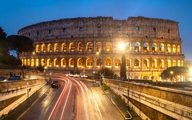 The coliseum illuminated at night, Rome, Italy