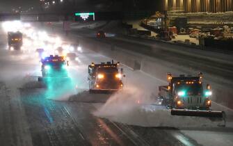 MINNEAPOLIS, MN. - FEBRUARY 2023: Snow plows move snow from highway I-35W southbound Wednesday, February 22, 2023 in Minneapolis, Minn., as the Twin Cities metro and much of the state of Minnesota prepares for what could be an epic winter storm, ending late Thursday (Photo by David Joles/Star Tribune via Getty Images)