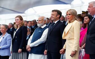 (From L) French Prime Minister Elisabeth Borne, French National Assembly president Yael Braun-Pivet, India's Prime Minister Narendra Modi, France's President Emmanuel Macron and first lady Brigitte Macron attend the Bastille Day military parade on the Champs-Elysees avenue in Paris on July 14, 2023. (Photo by GONZALO FUENTES / POOL / AFP) (Photo by GONZALO FUENTES/POOL/AFP via Getty Images)