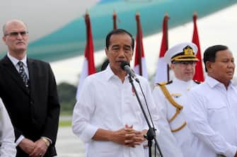 epa10480992 Indonesia President Joko Widodo (C) gives a speech as the country's National Disaster Management Authority (BNPB) prepares to send supplies to earthquake victims in Turkey, at Halim Perdana Kusuma Military Airport in Jakarta, Indonesia, 21 February 2023. In addition to supplies, Indonesia is sending a rescue team.  EPA/BAGUS INDAHONO