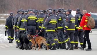 epa10451026 Romanian rescue workers before being deployed to Southern Turkey to help local authorities in their rescue missions after the devastating earthquake that hit Turkey and Syria, at the military airbase no. 90, in Otopeni, near Bucharest, Romania, 06 February 2023. Two Romanian military aircraft will take 58 rescuers and 4 specialized dogs to Turkey, as well as the materials necessary for their mission, which will support the efforts of the Turkish authorities to search for survivors in the areas affected by the latest earthquakes. According to the US Geological Service, an earthquake with a preliminary magnitude of 7.8 struck southern Turkey close to the Syrian border. The earthquake caused buildings to collapse and sent shockwaves over northwest Syria, Cyprus, and Lebanon.  EPA/ROBERT GHEMENT